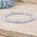 Bracelet Calcédoine Bleue 6 mm – Douceur du Dialogue