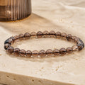 Bracelet Cristal de Roche Fumé 6 mm – Ancrage de l’Ombre