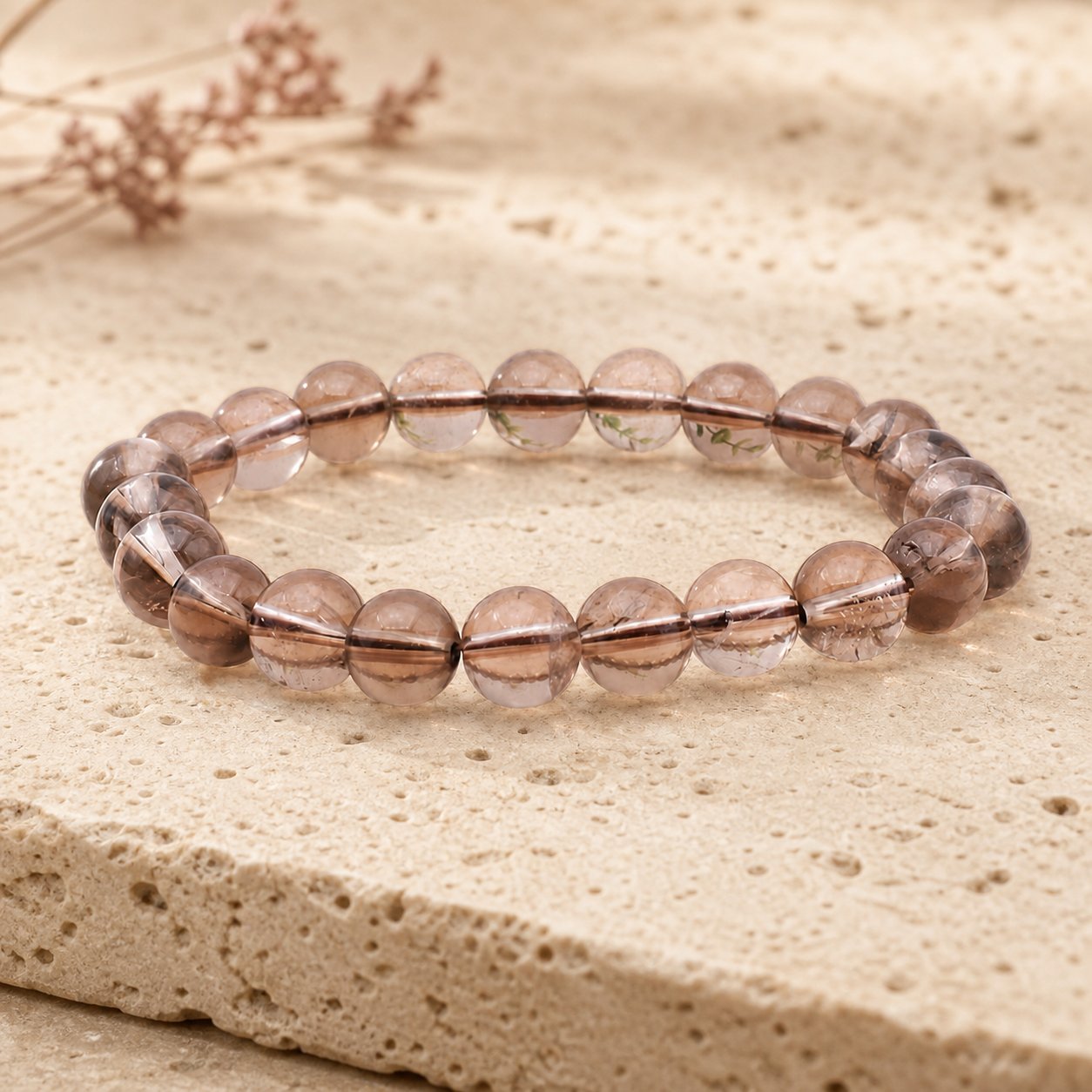 Bracelet Cristal de Roche Fumé 8 mm – Traversée Protégée