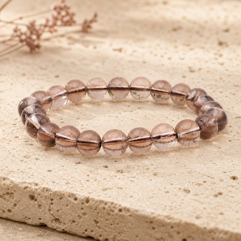 Bracelet Cristal de Roche Fumé 8 mm – Traversée Protégée