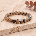 Bracelet Cristal de Roche Rutile Hématite 10 mm – Équilibre des Forces