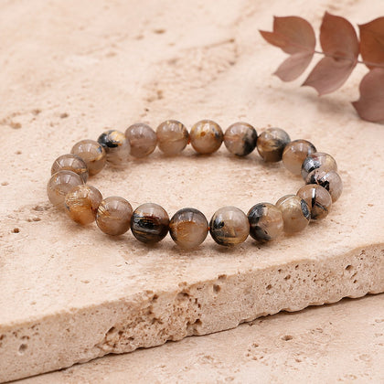 Bracelet Cristal de Roche Rutile Hématite 10 mm – Équilibre des Forces