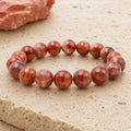 Bracelet Pierre de Soleil Noire Orangée 10 mm – Force de la Chaleur